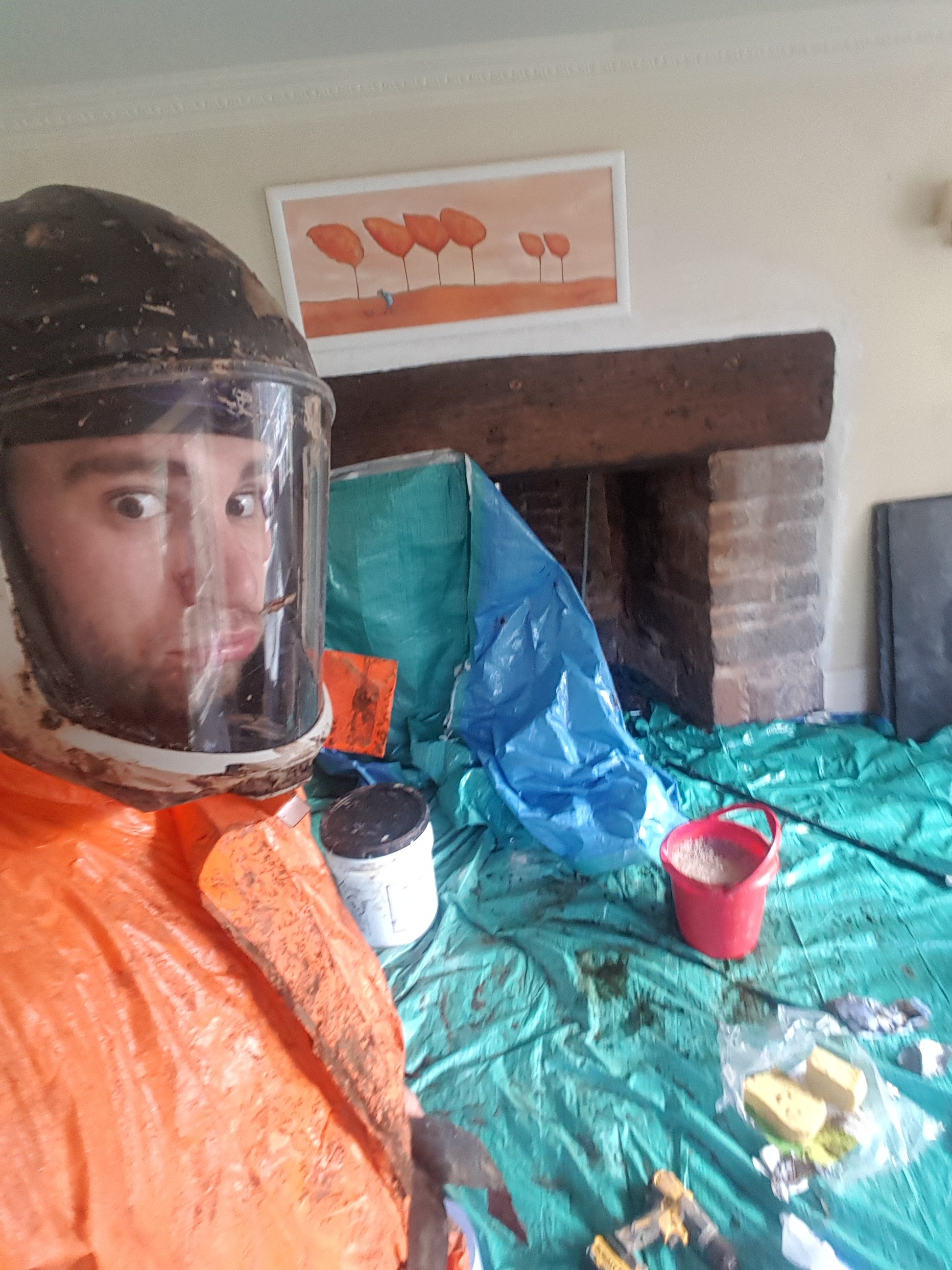 Danny hodgson is a master chimney sweep in devon undertaking a full pcr treatment in crediton, devon. Danny is wearing 3m jupiter mask and hazardous waster suit