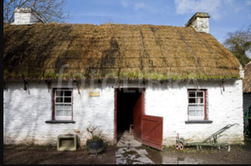 Typical irish cottage with chimneys on the gable end walls 