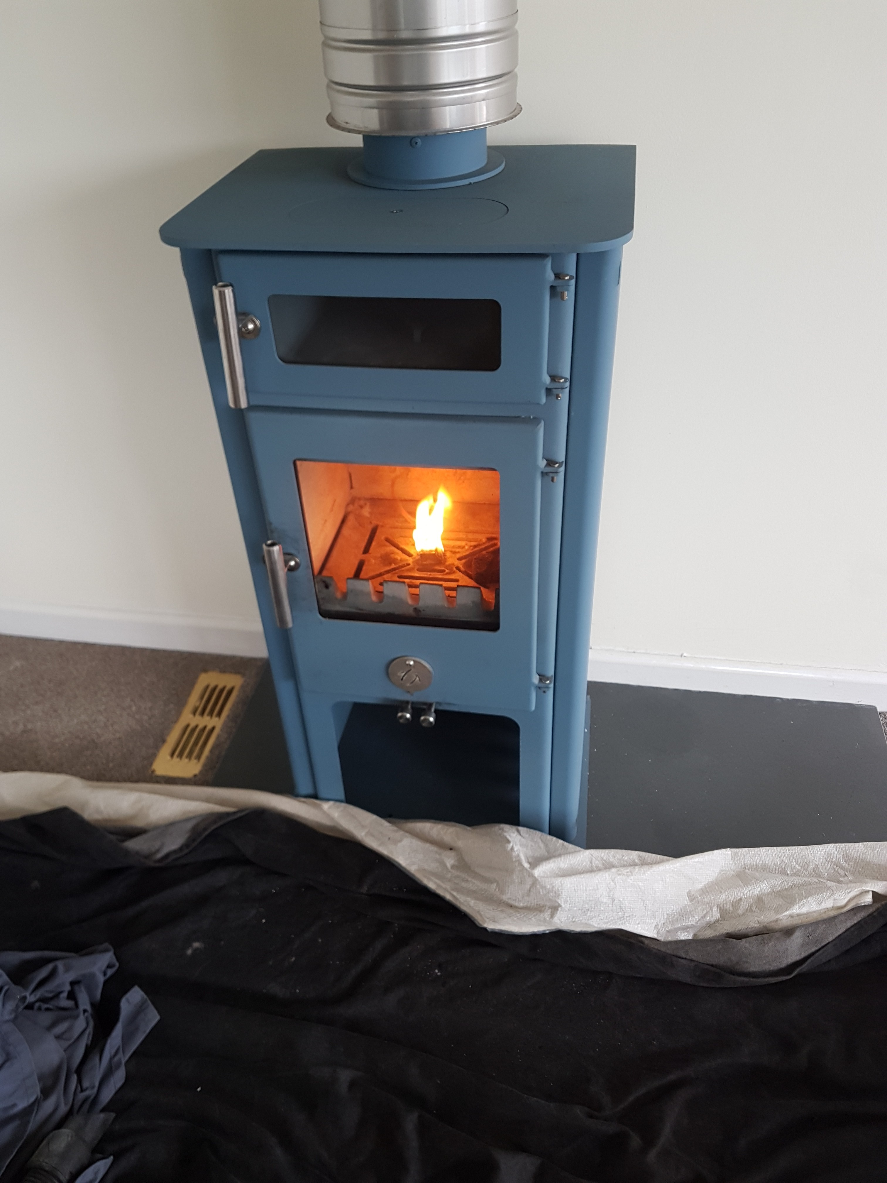 Full service, parts replacement and recomissioning of a Chilli Penguin Woodburner by Hodgsons Chimney Sweeps in Paignton