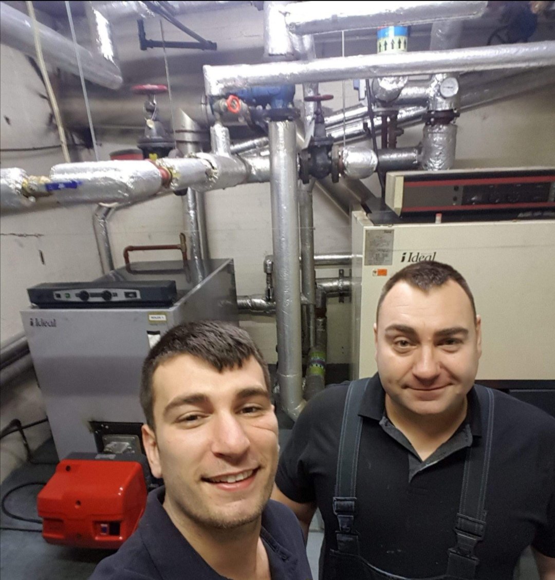 Danny and Daniel Hodgson of Hodgsons Chimney Sweeps undertaking oil boiler fault diagnostics for a  large 750kw oil boiler system